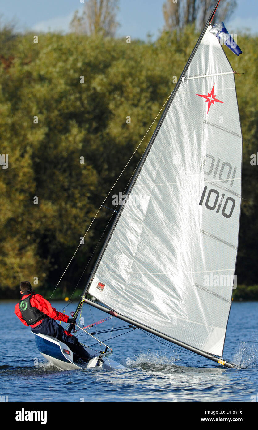 Single handed yachtsman sailing his boat Stock Photo Alamy