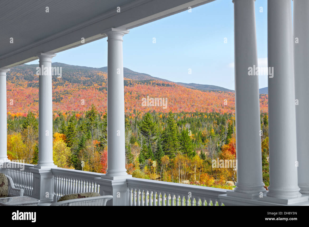 New Hampshire porch with mountains and fall leaves Stock Photo