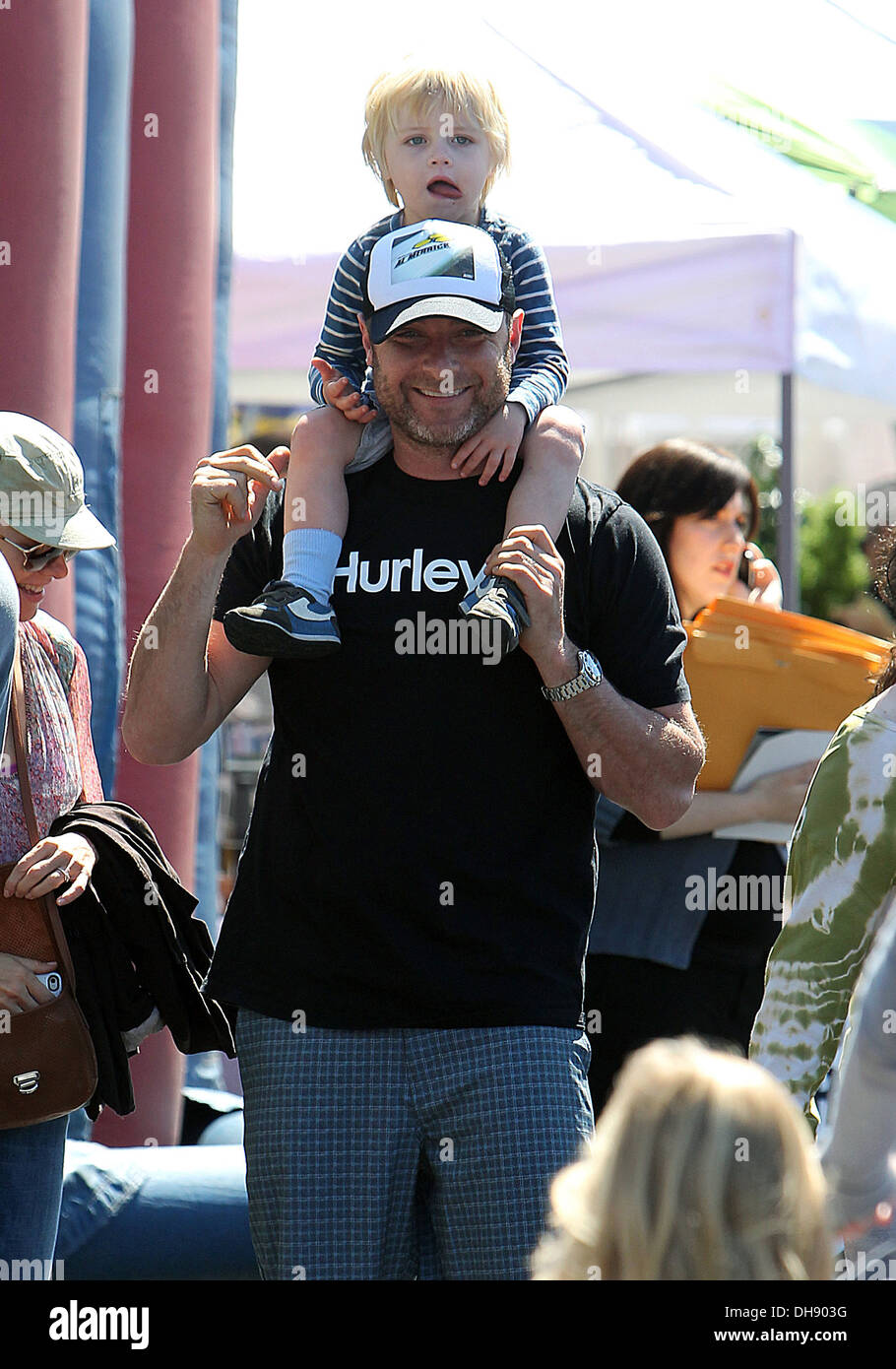 Liev Schreiber holds his son Alexander Pete at a farmers market in Brentwood Los Angeles California - 01.04.12 Stock Photo