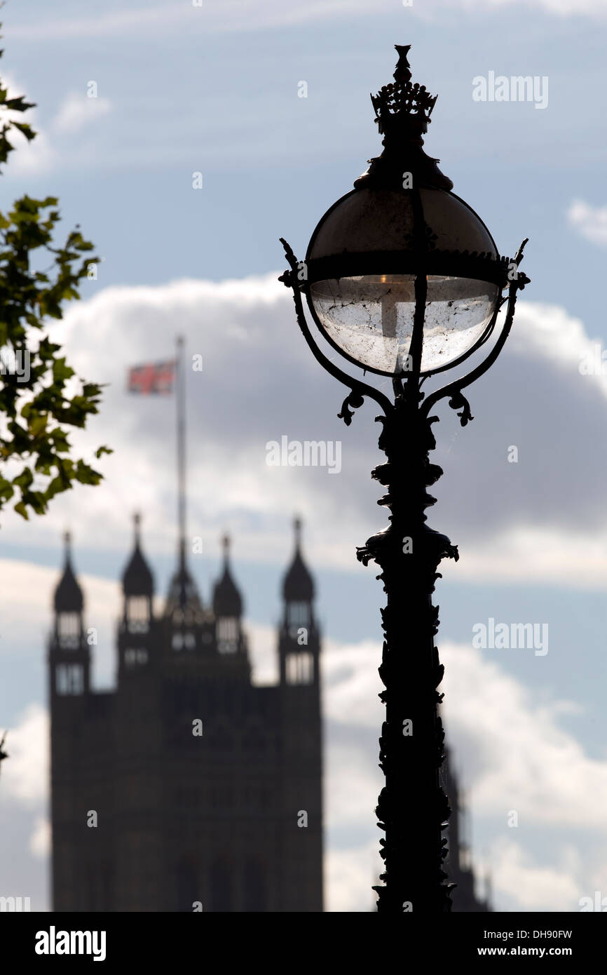 Victorian Lamppost designed by George John Vulliamy with The Victoria Tower in the background, London UK. Stock Photo