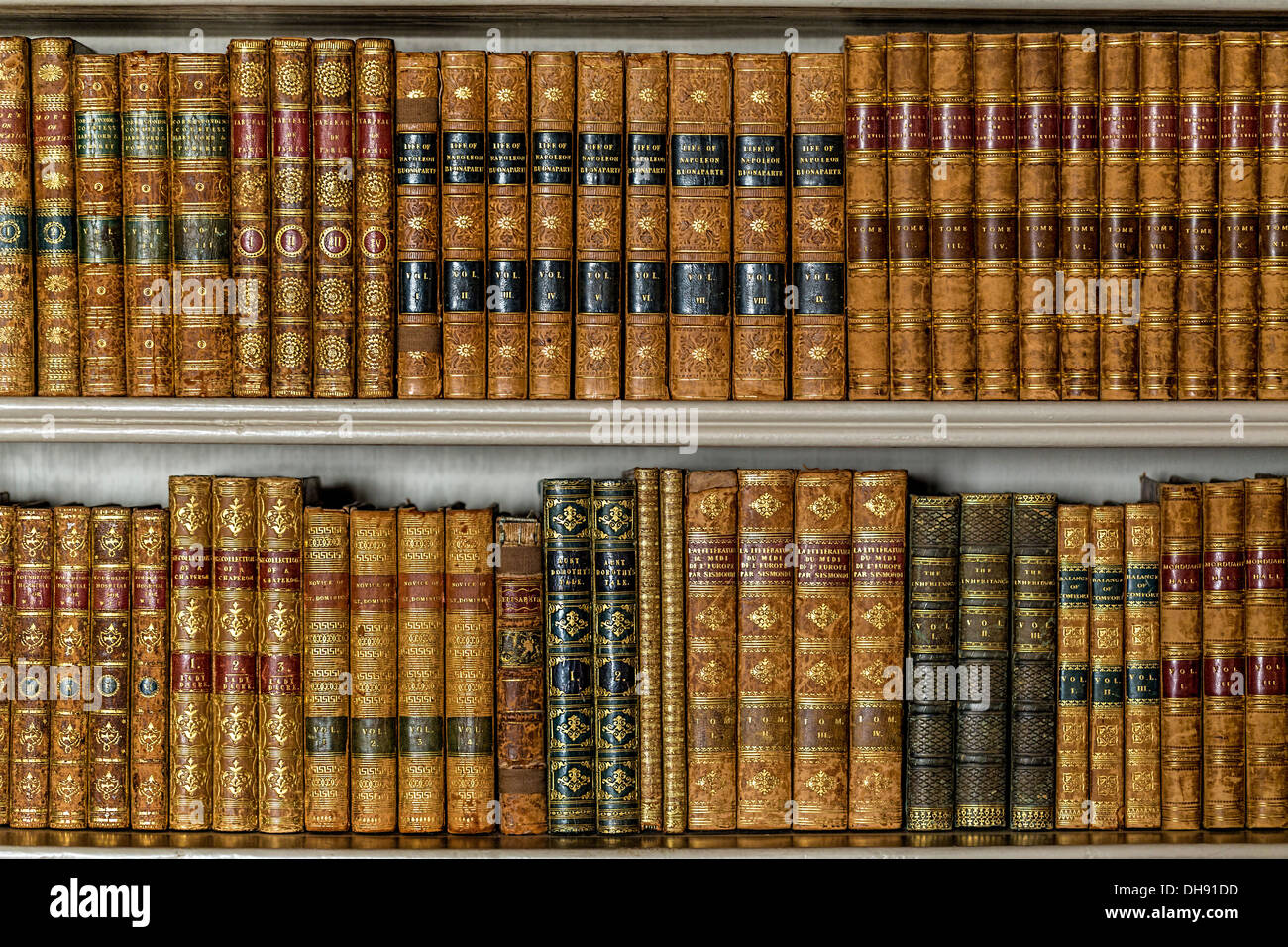 Old books arranged on shelving Stock Photo Alamy