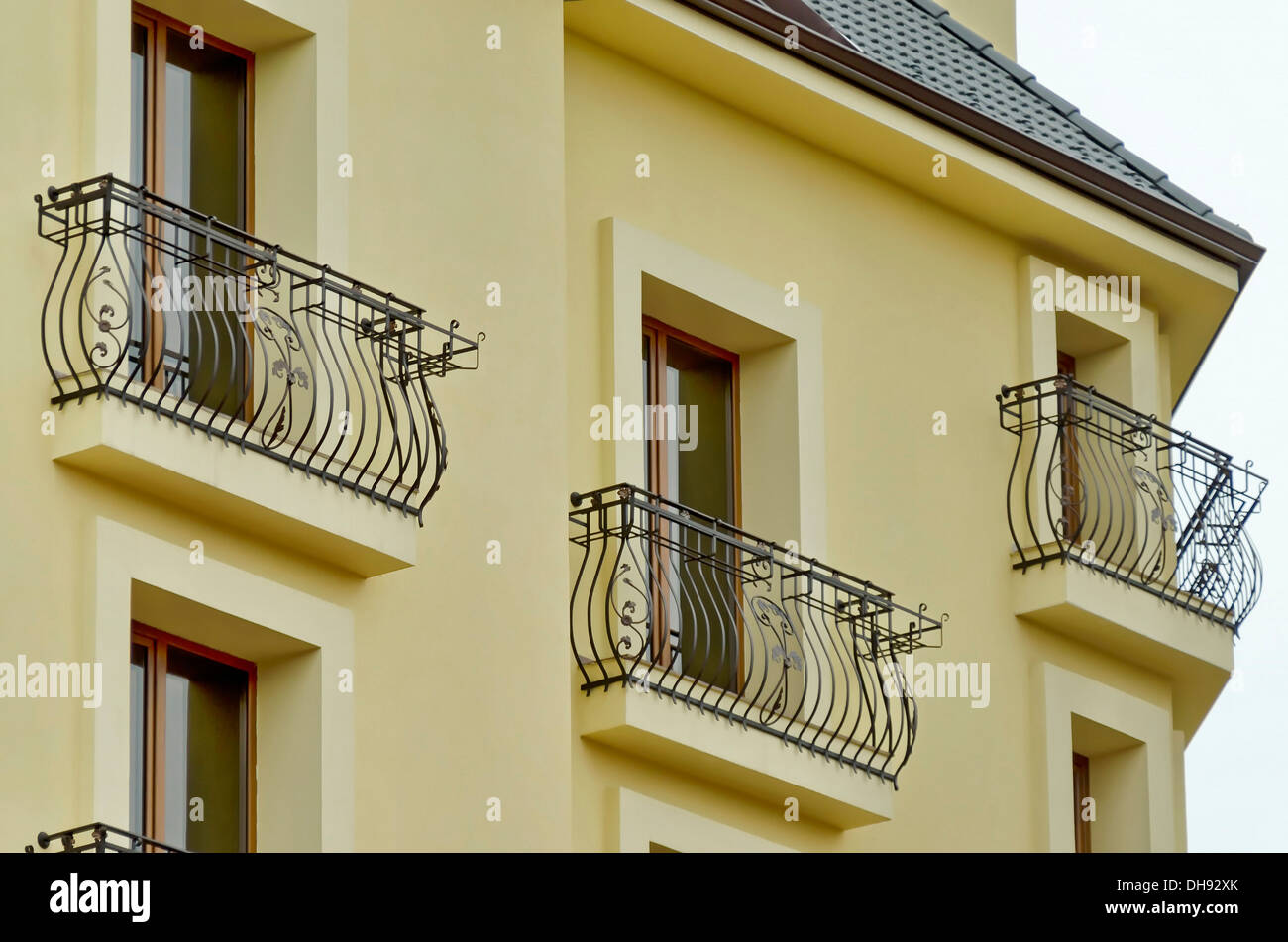 New building - balcony with metal ornaments rail Stock Photo