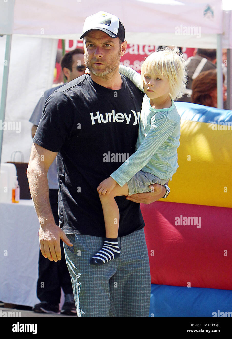 Liev Schreiber holds his son Samuel Kai at a farmers market in Brentwood Los Angeles California - 01.04.12 Stock Photo