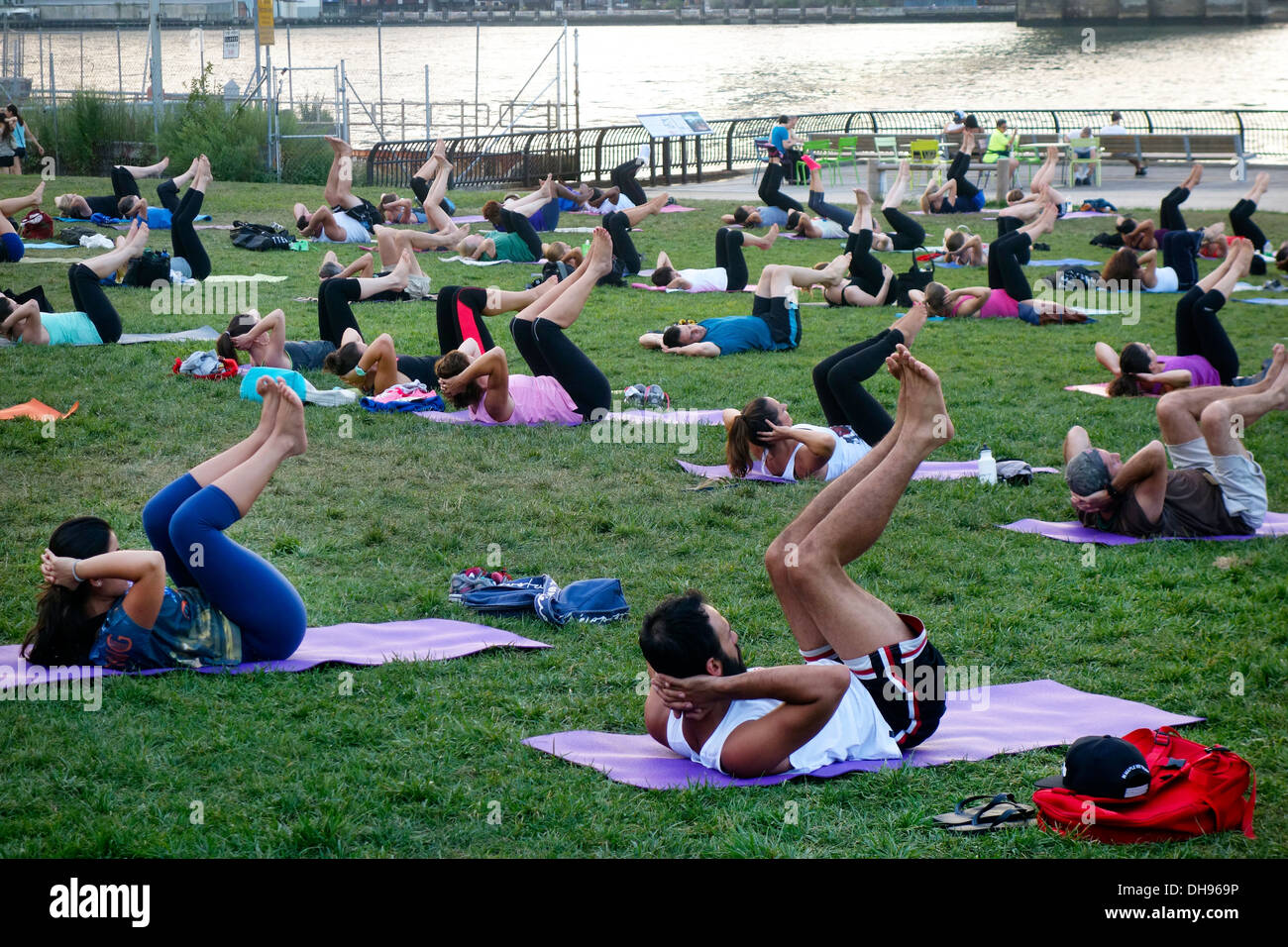 yoga in Brooklyn Bridge park Stock Photo Alamy
