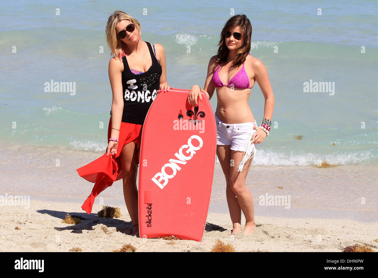 Lucy Hale and Ashley Benson stars of ABC's hit show "Pretty Little Liars"  and Bongo spokeswomen hit Bongo Bikini Shack for a Stock Photo - Alamy