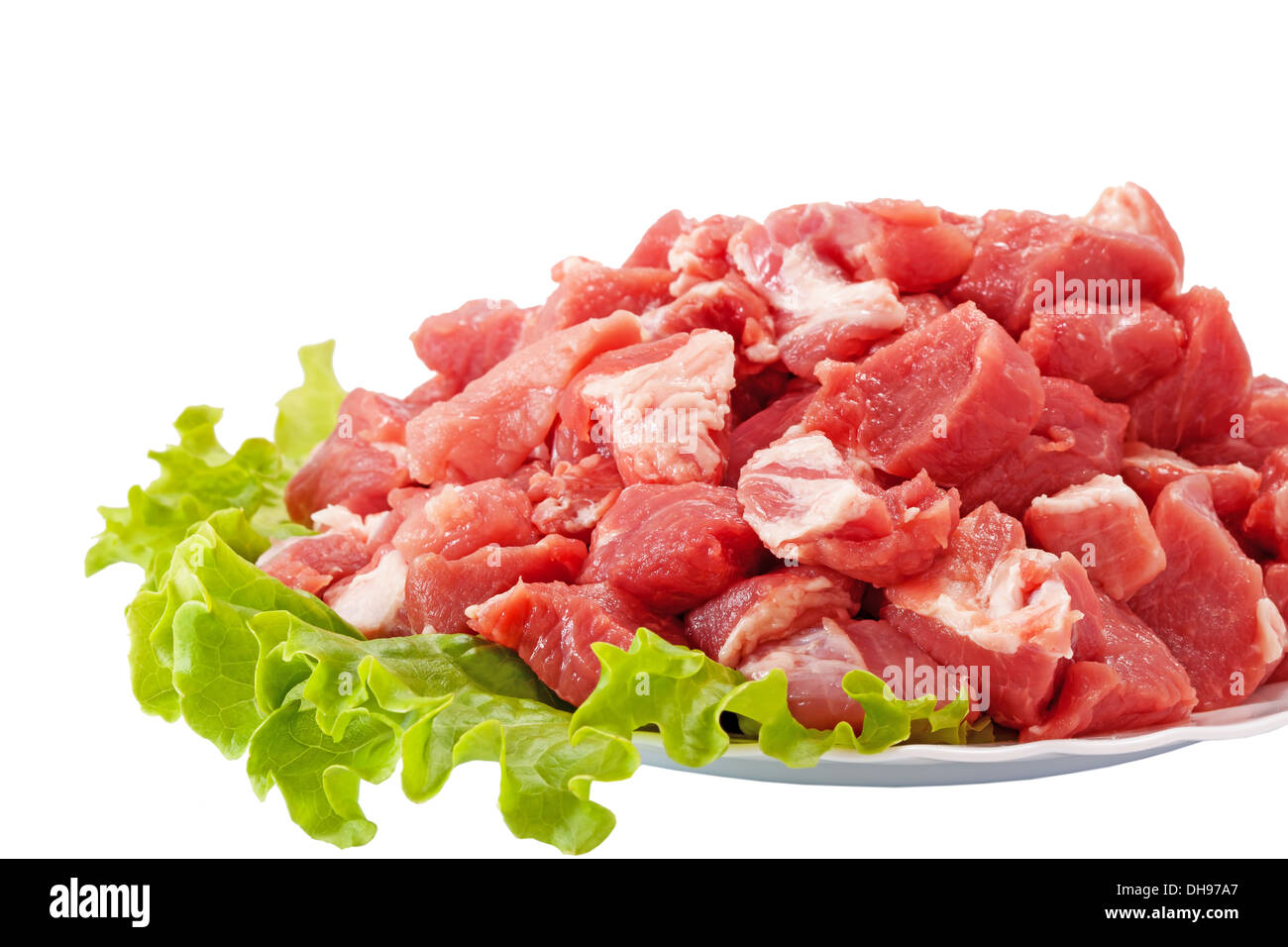 Fresh raw meat and salad isolated on white Stock Photo