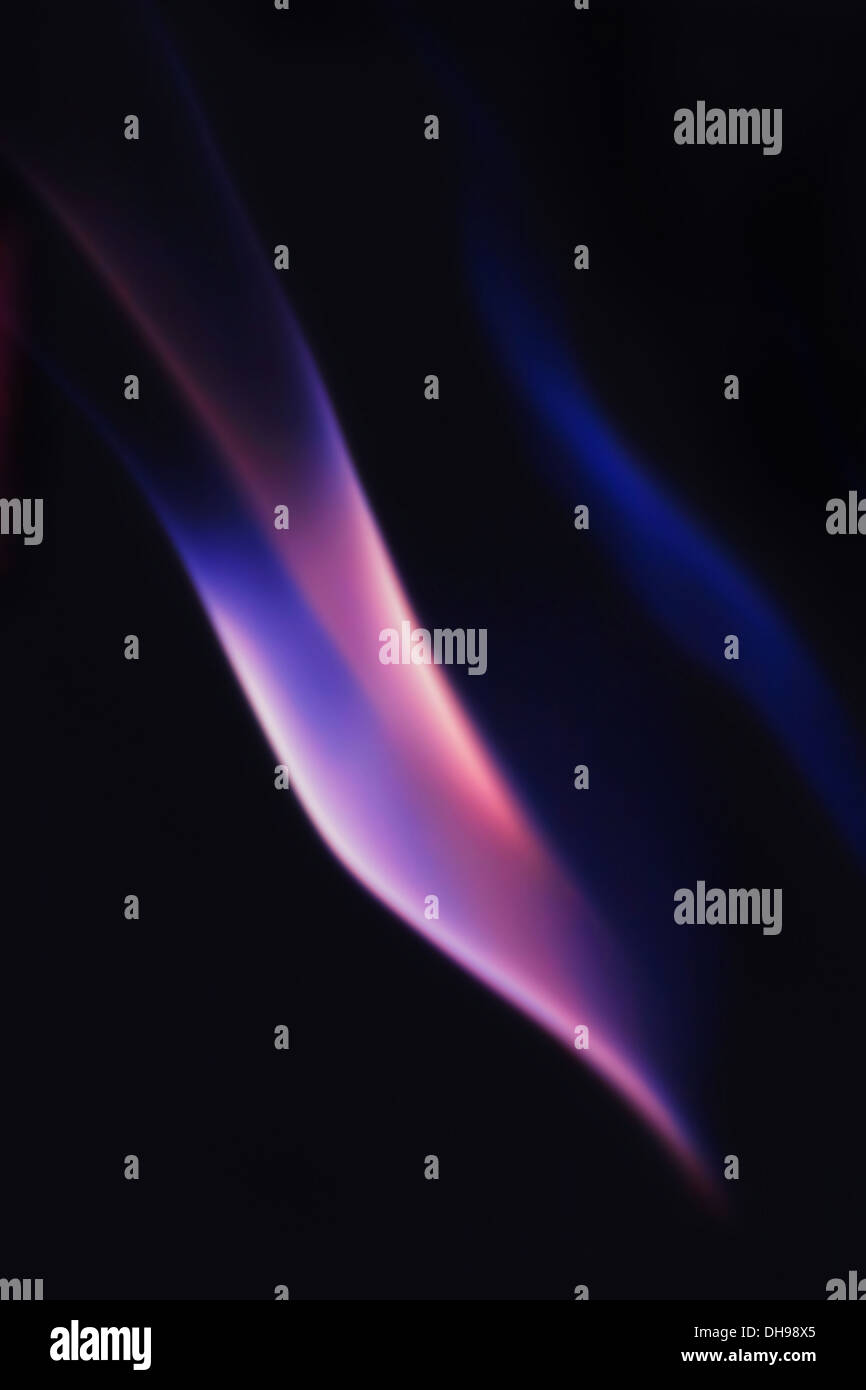Abstract colorful smoke on a black background Stock Photo - Alamy