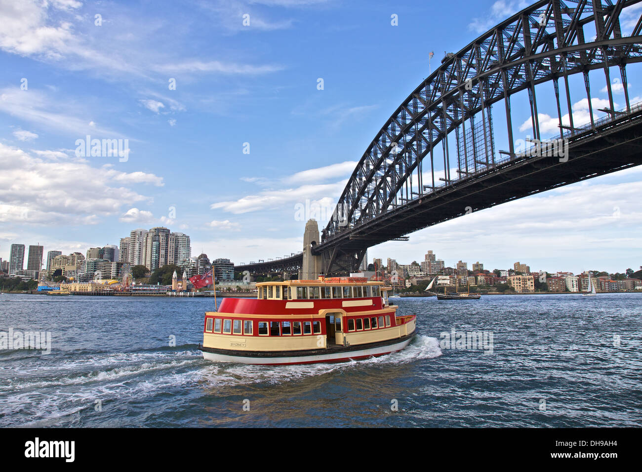 Sydney Harbor Ferry Under the Iconic Sydney Bridge in Circular Quay Stock Photo