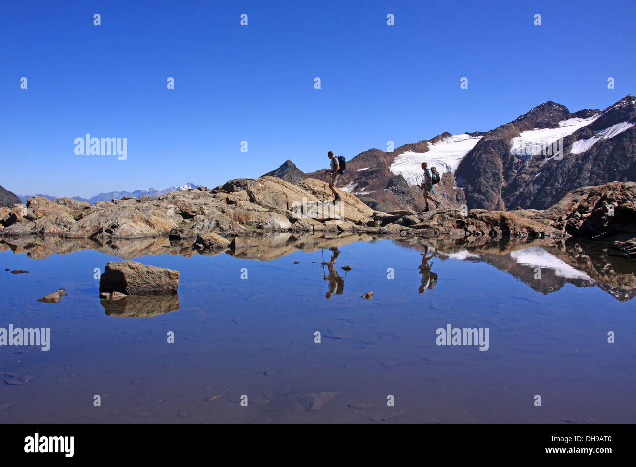 Two people walking mountains hi-res stock photography and images - Alamy