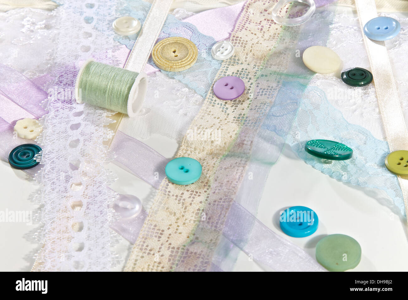 Sewing, Ribbons, buttons and material Stock Photo Alamy