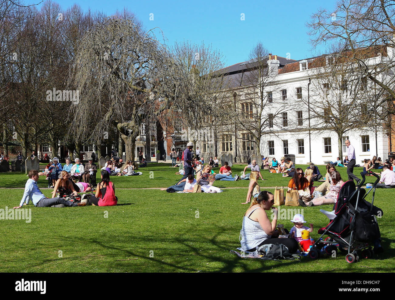 People enjoying the sunny weather in Winchester Winchester, Hampshire