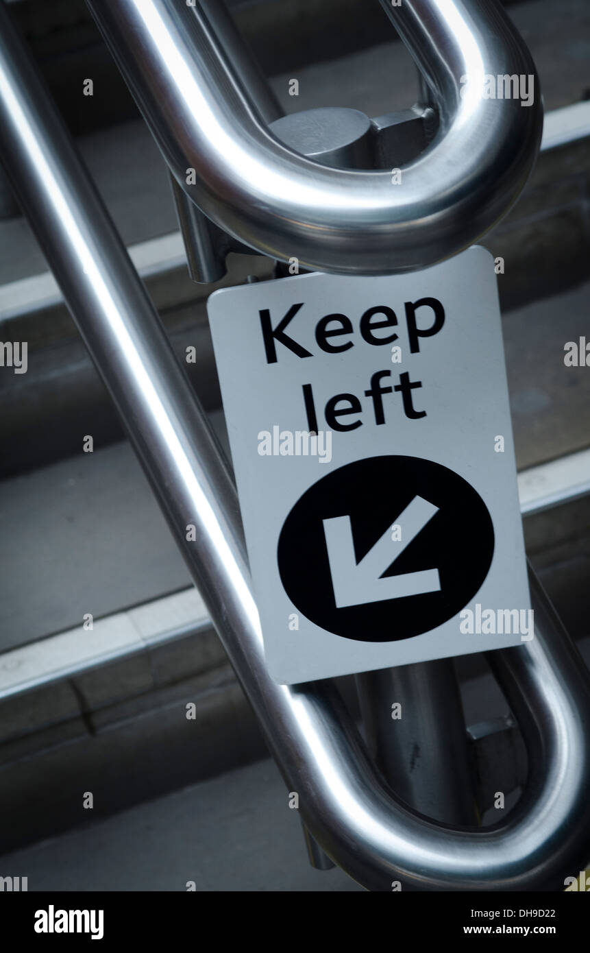 Keep Left sign in railway station Stock Photo