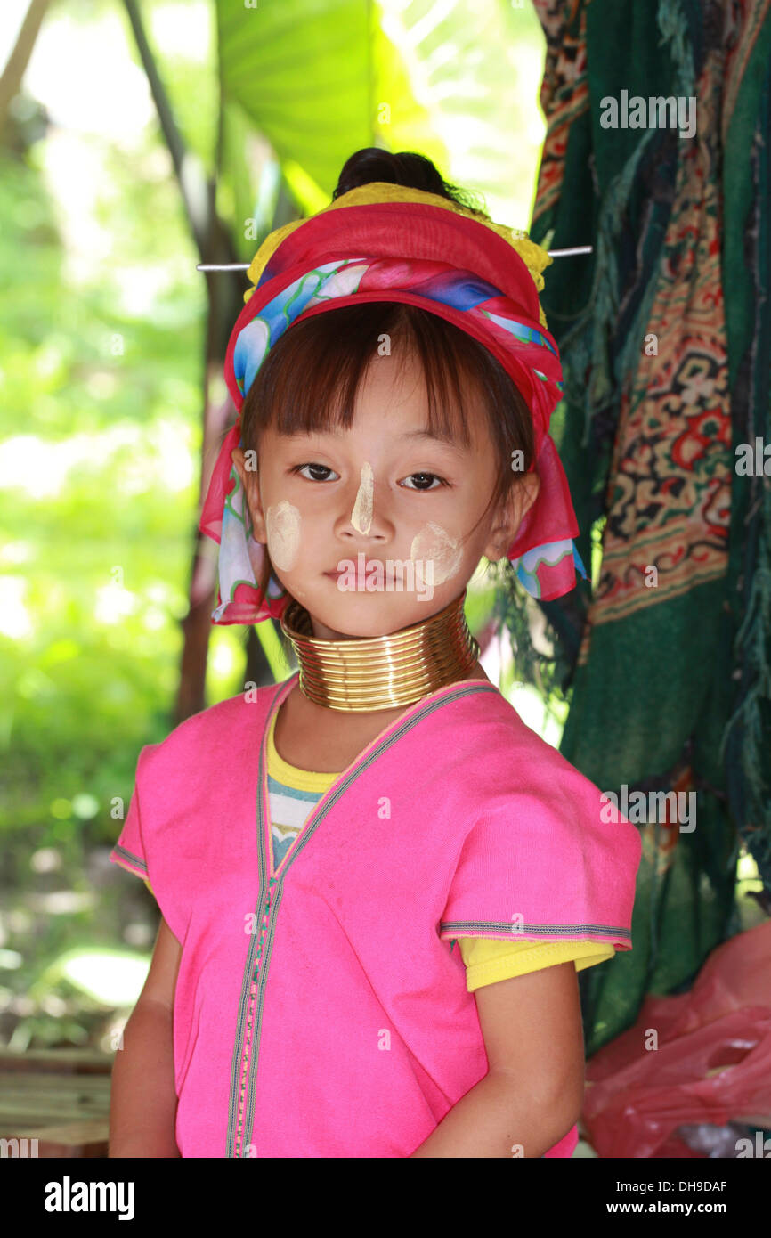 Long Neck Child wearing traditional dress and paint. Stock Photo