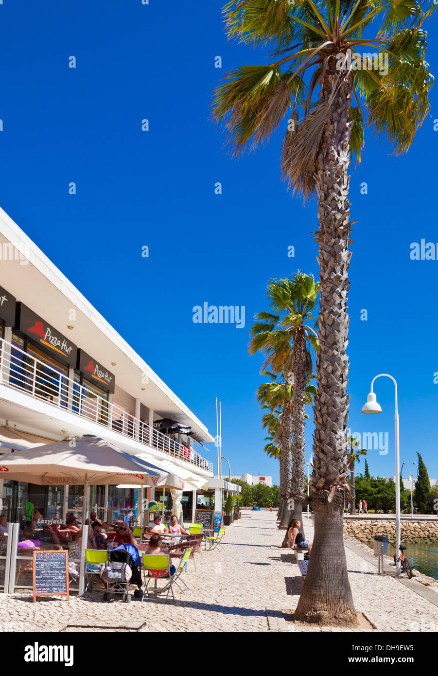 Shops cafes and restaurnats at the Marina de Lagos Algarve Portugal EU Europe Stock Photo
