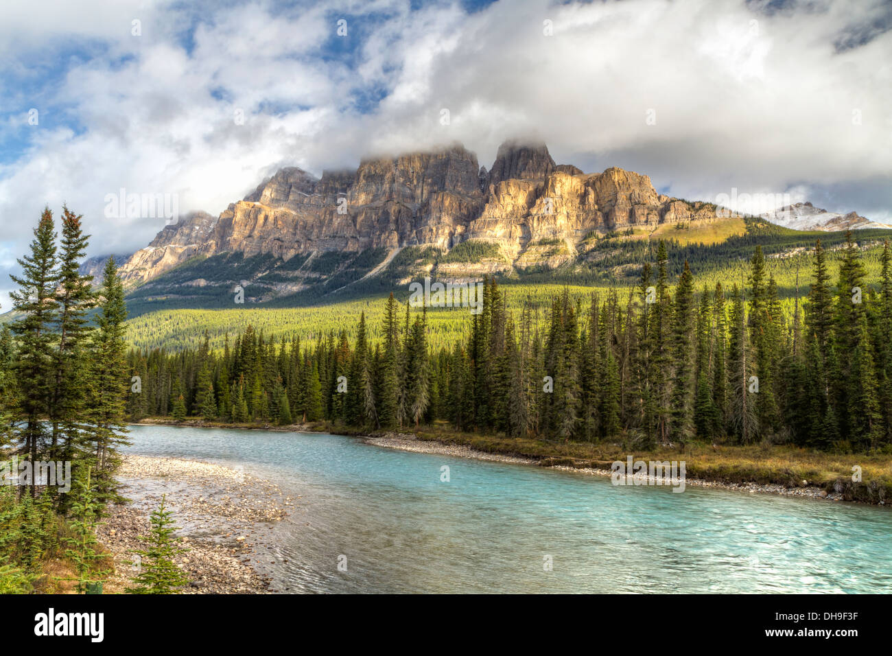 Castle Mountain emerges from the clouds above the Bow River in Banff National Park, Alberta (HDR) Stock Photo