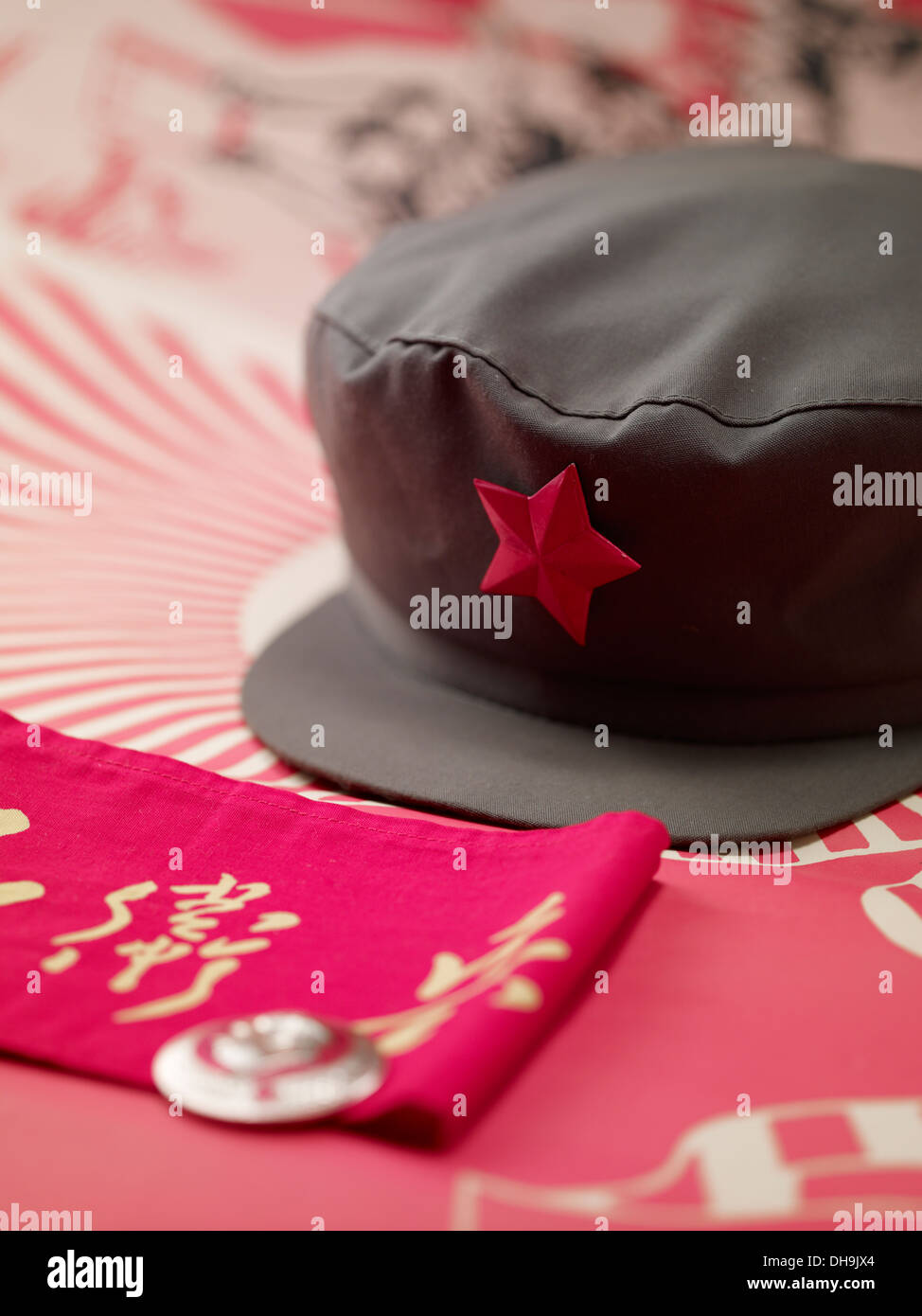 Chinese Communist soldier red army cap, military hat, and slogan Stock Photo