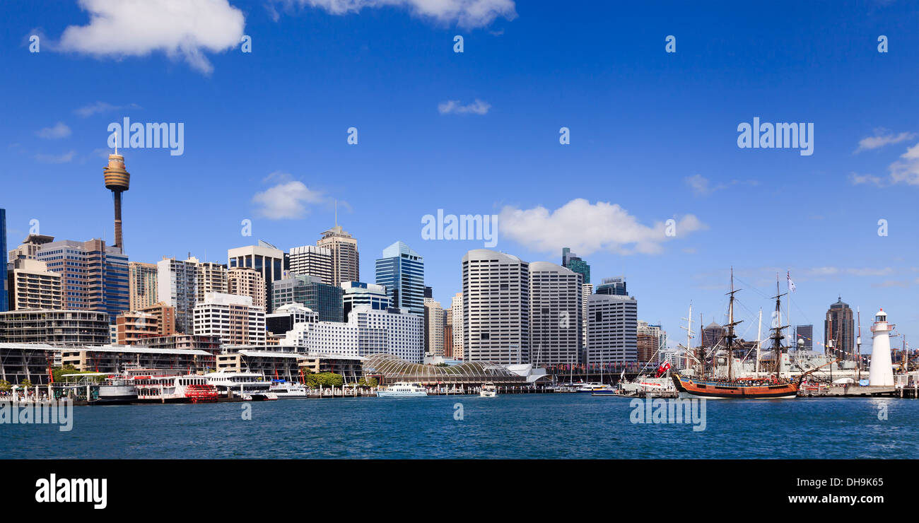 australia sydney darling harbour bay panoramic view on the city with skyscrapers, tower and tall-ship Endevour with lighthouse a Stock Photo