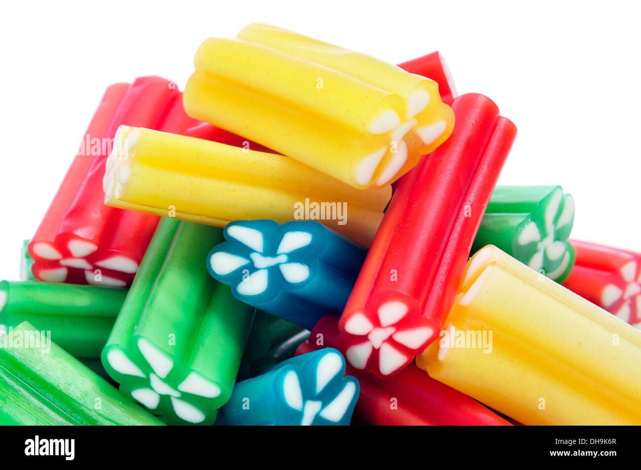 closeup of a pile of liquorice candies of different colors on a white background Stock Photo