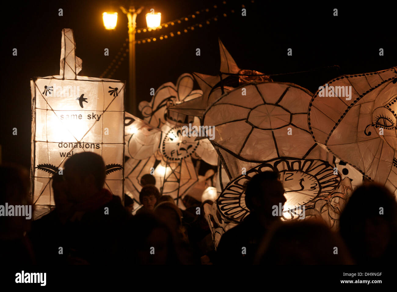 Participants take part in the Burning of the clocks procession and