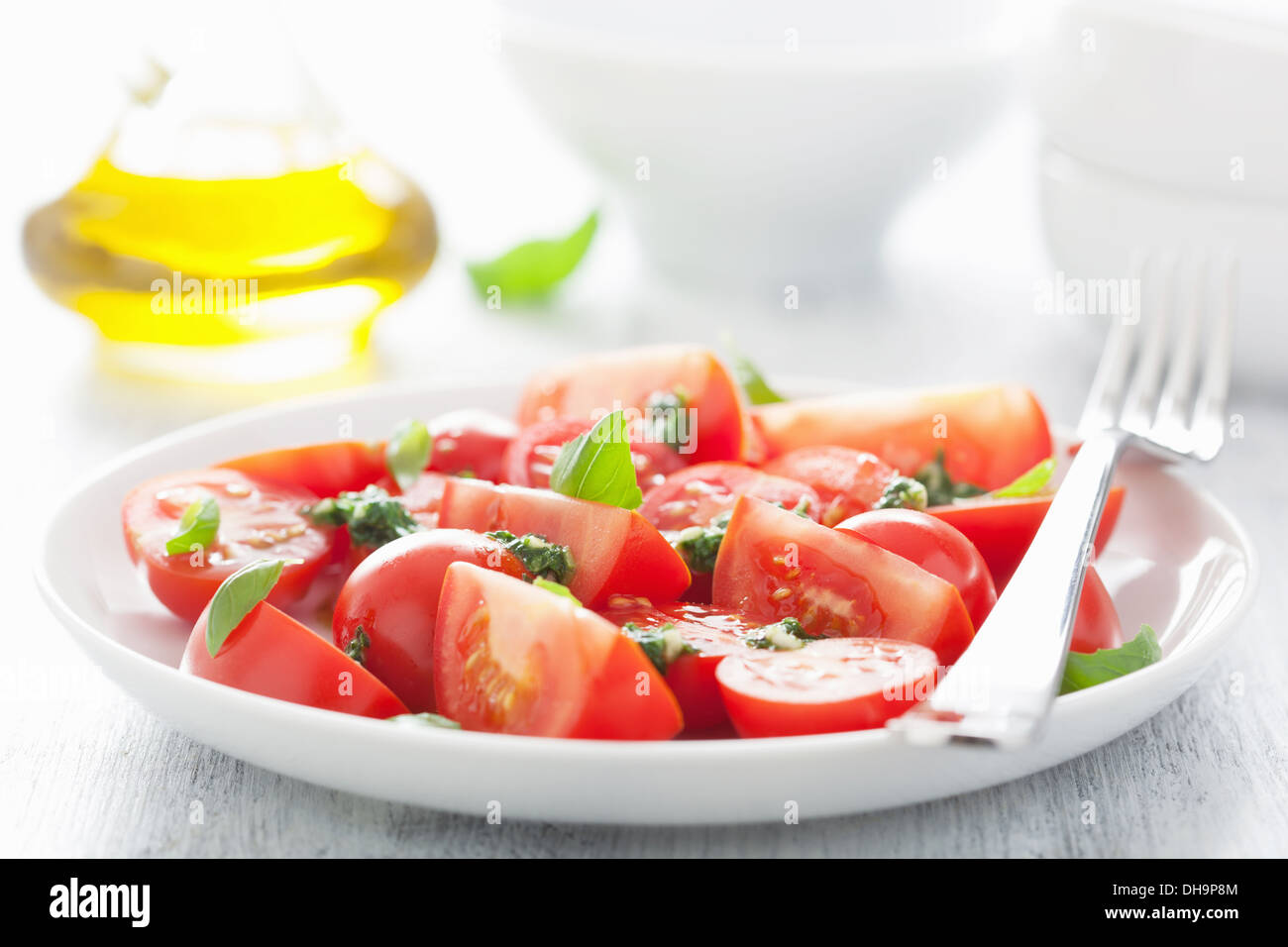 tomato salad with basil dressing Stock Photo Alamy