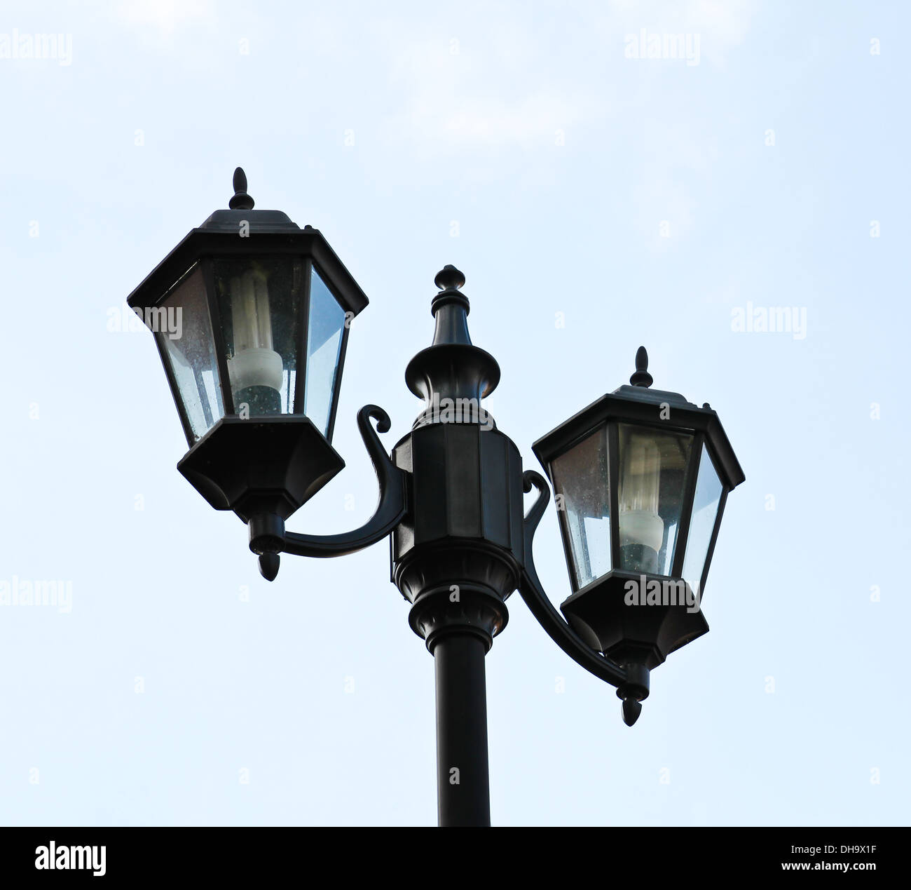 Old city lamp isolated on sky Stock Photo