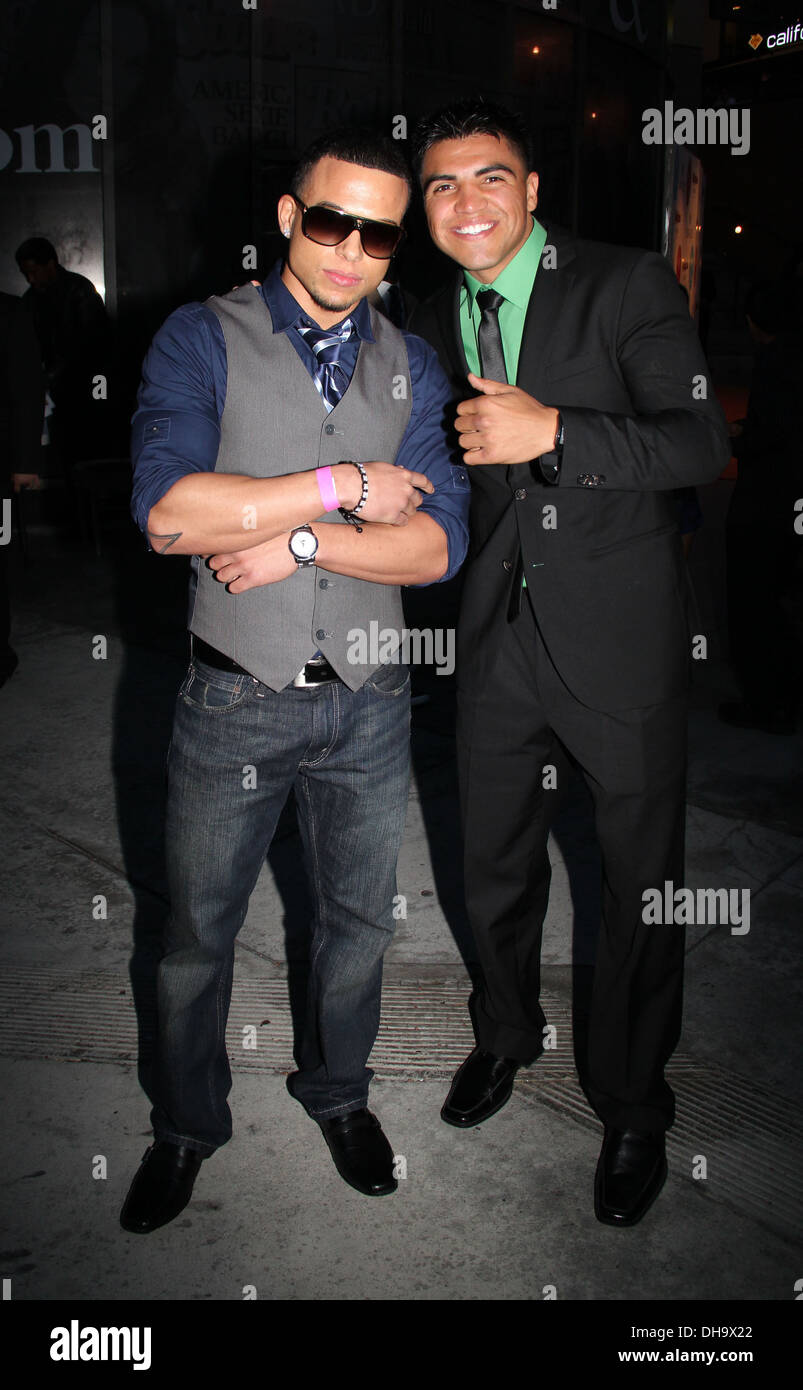 Victor Ortiz and Chris Perry outside Rolling Stone Los Angeles restaurant and lounge in Hollywood Los Angeles California - Stock Photo