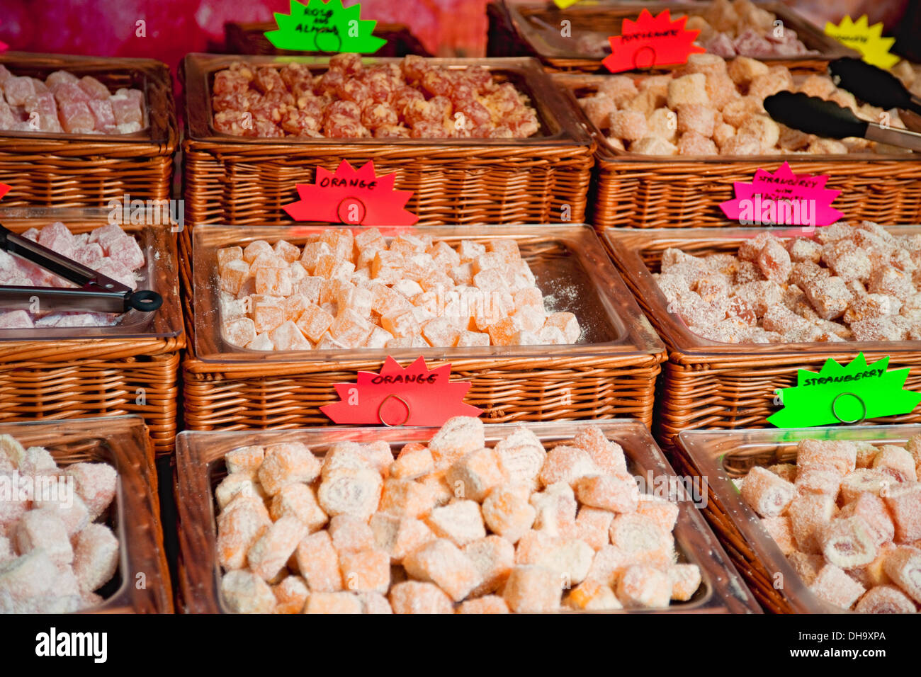 Selection of Turkish Delight sweets candy displayed in baskets on a