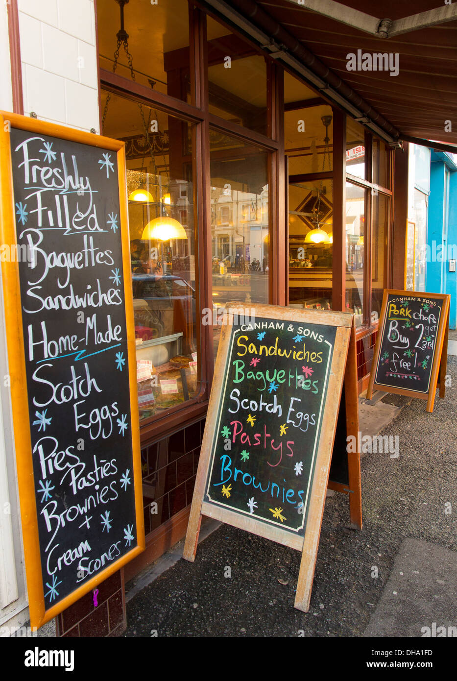 Blackboards outside Canham & Sons, a traditional butcher shop on Church Road, Brighton & Hove Stock Photo