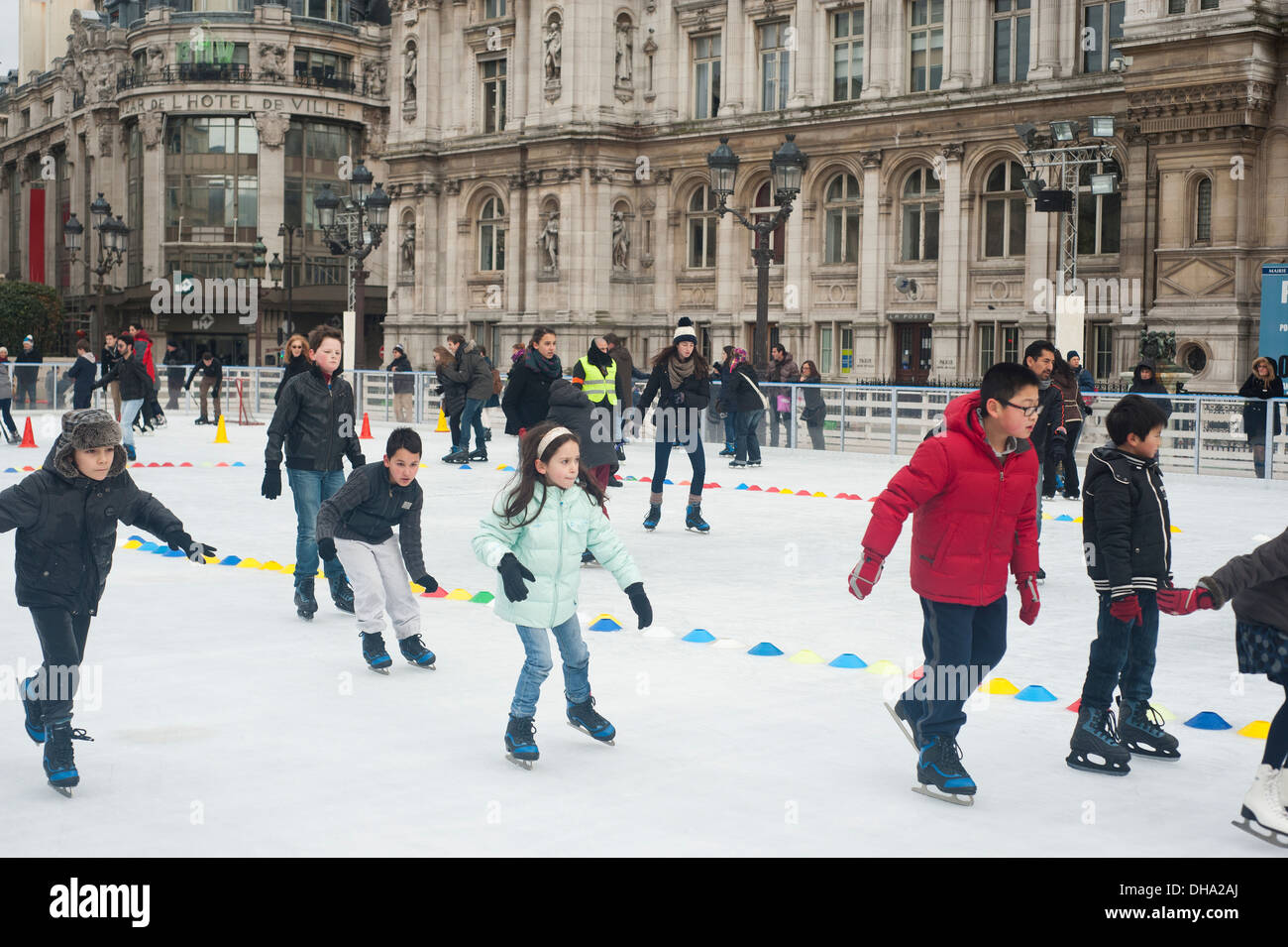 Paris, France Young people ice skating at Hotel de Ville at Christmas time Stock Photo Alamy