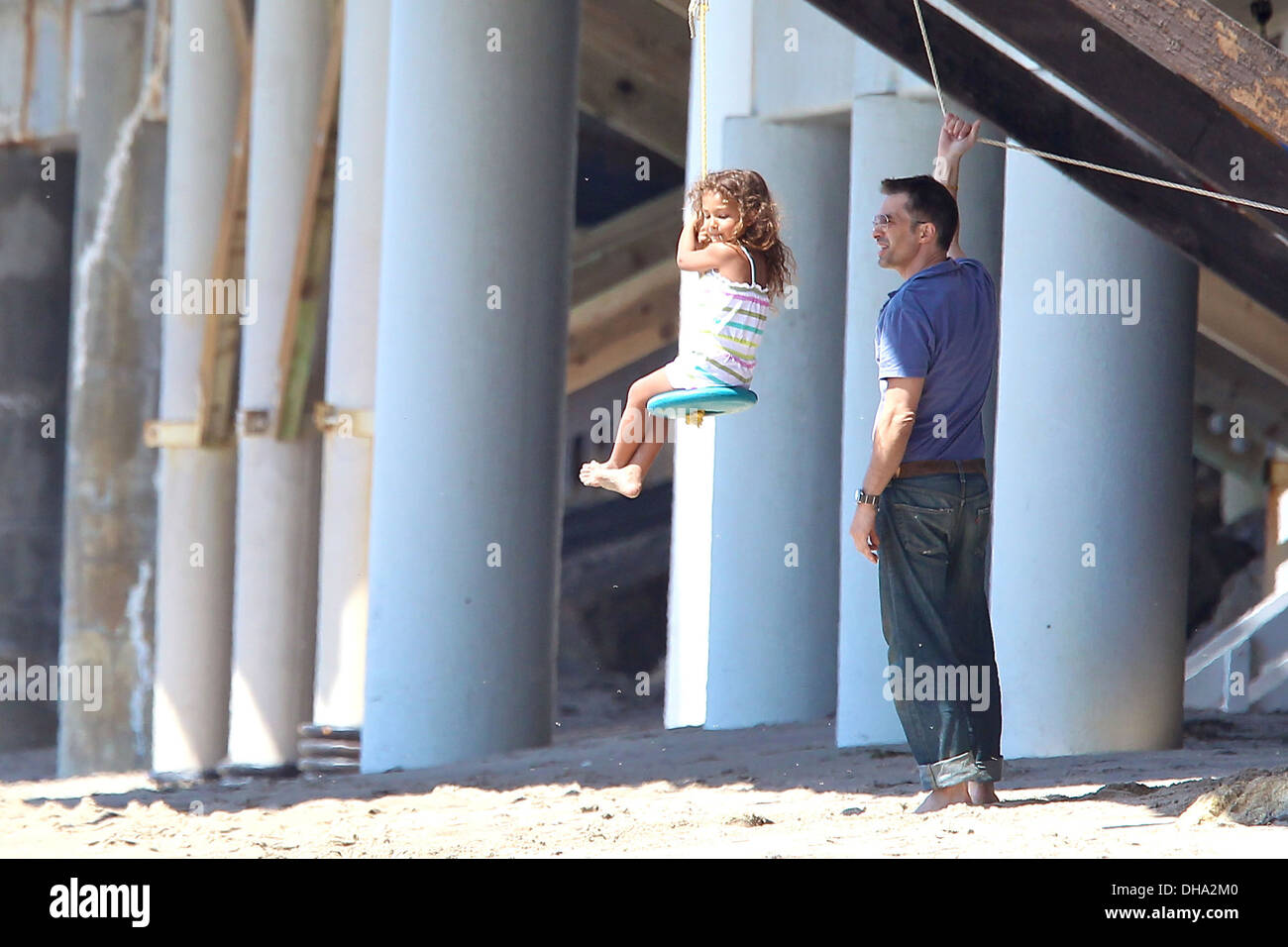 Olivier Martinez and his fiancee's daughter Nahla Aubry playing on Malibu Beach Los Angeles California - 07.04.12 Stock Photo