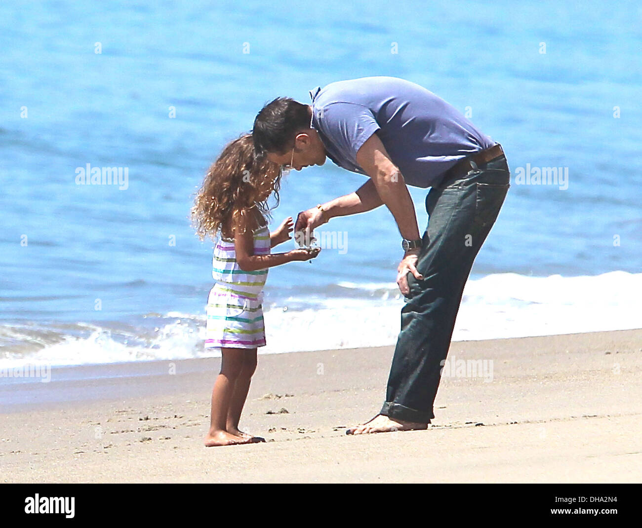 Olivier Martinez and his fiancee's daughter Nahla Aubry playing on Malibu Beach Los Angeles California - 07.04.12 Stock Photo