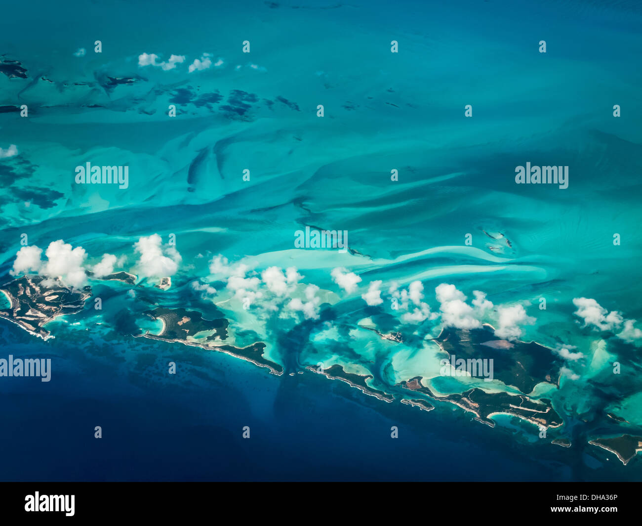 Aerial view of chain of Caribbean islands surrounded by greenish
