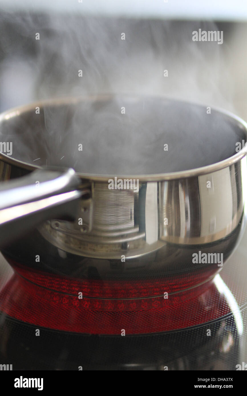A pot of boiling water Stock Photo Alamy