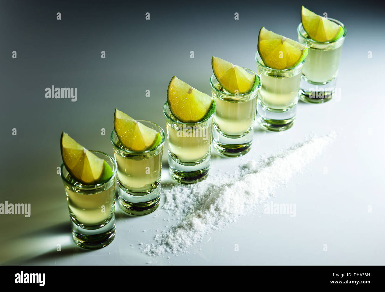 Tequila lime and salt on white reflexive background stock photo alamy