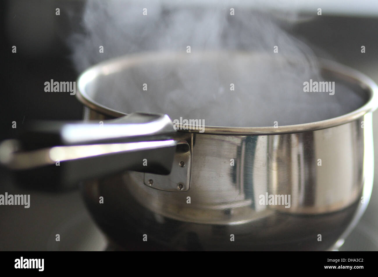 A pot of boiling water Stock Photo Alamy