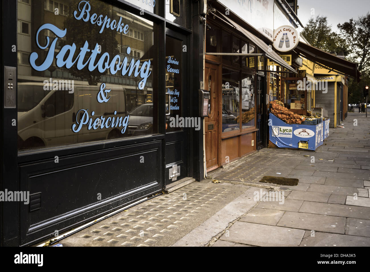 A Tattoo Parlour on the Caledonian Road in Islington, North London, on a Sunday morning in November. Stock Photo