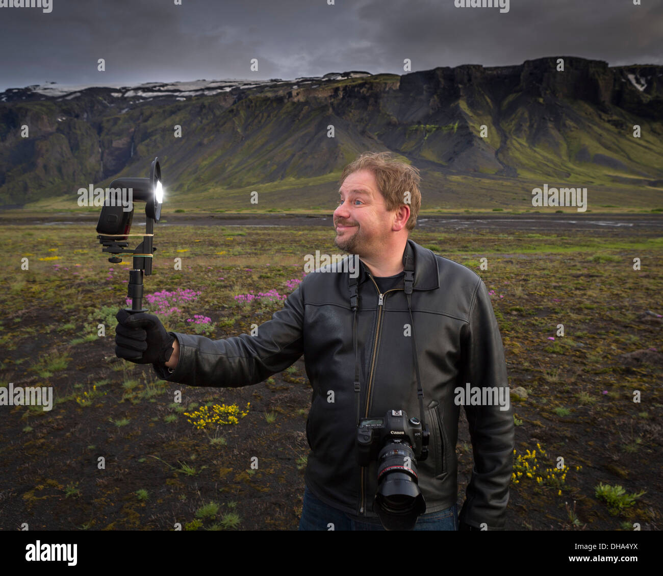 Photographer taking self portrait, South Coast, Iceland Stock Photo