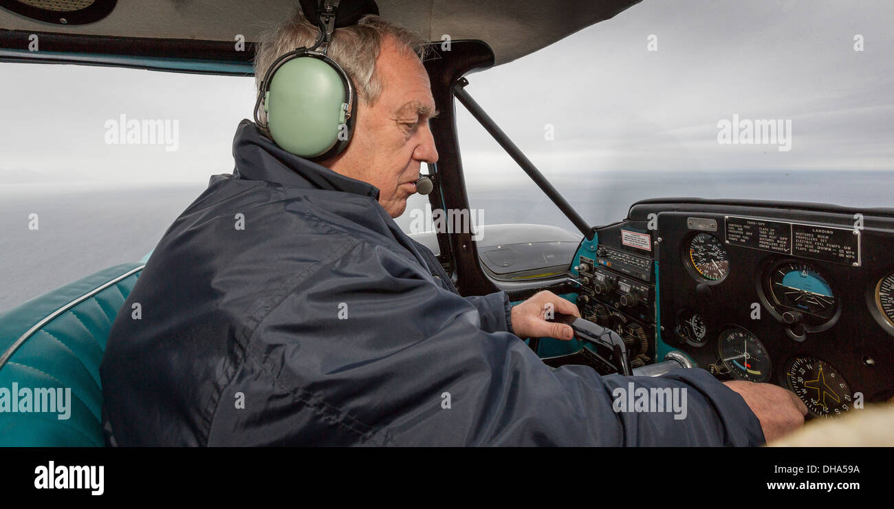 Pilot in a small craft known as the Piper PA-23 Aztec, Grimsey Island, Iceland Stock Photo