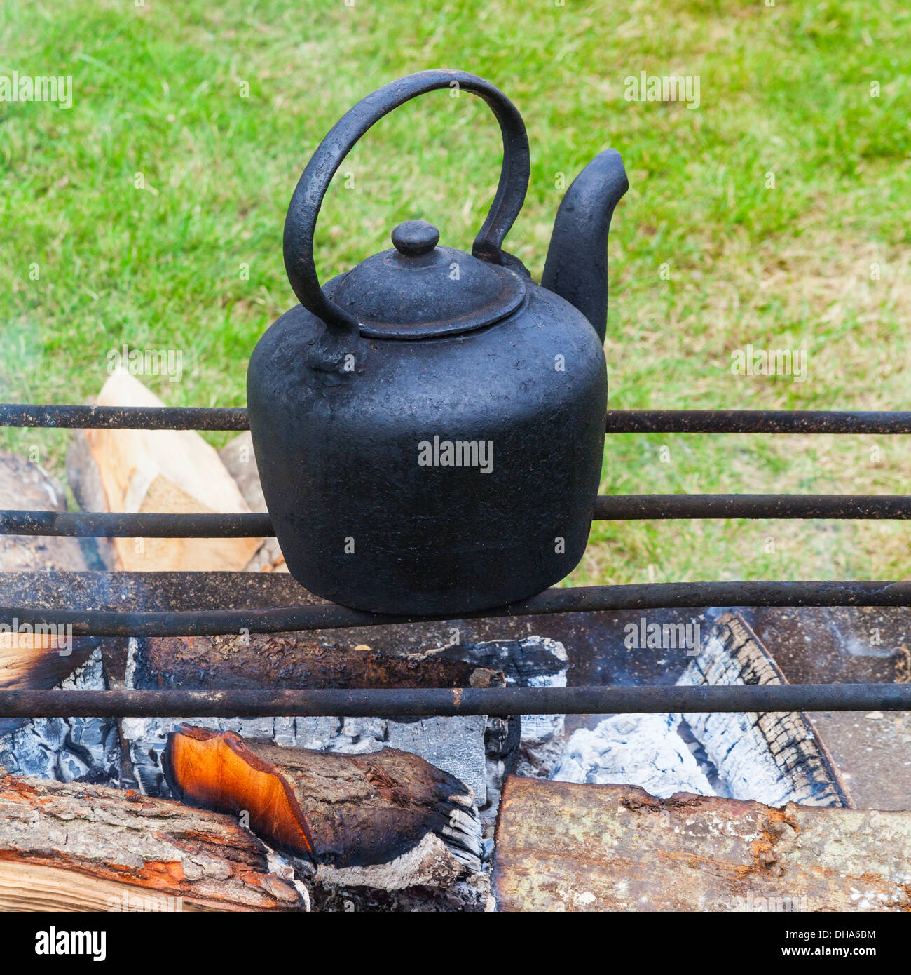 Campfire kettle closeup with blurred bonfire in the background Stock Photo  - Alamy