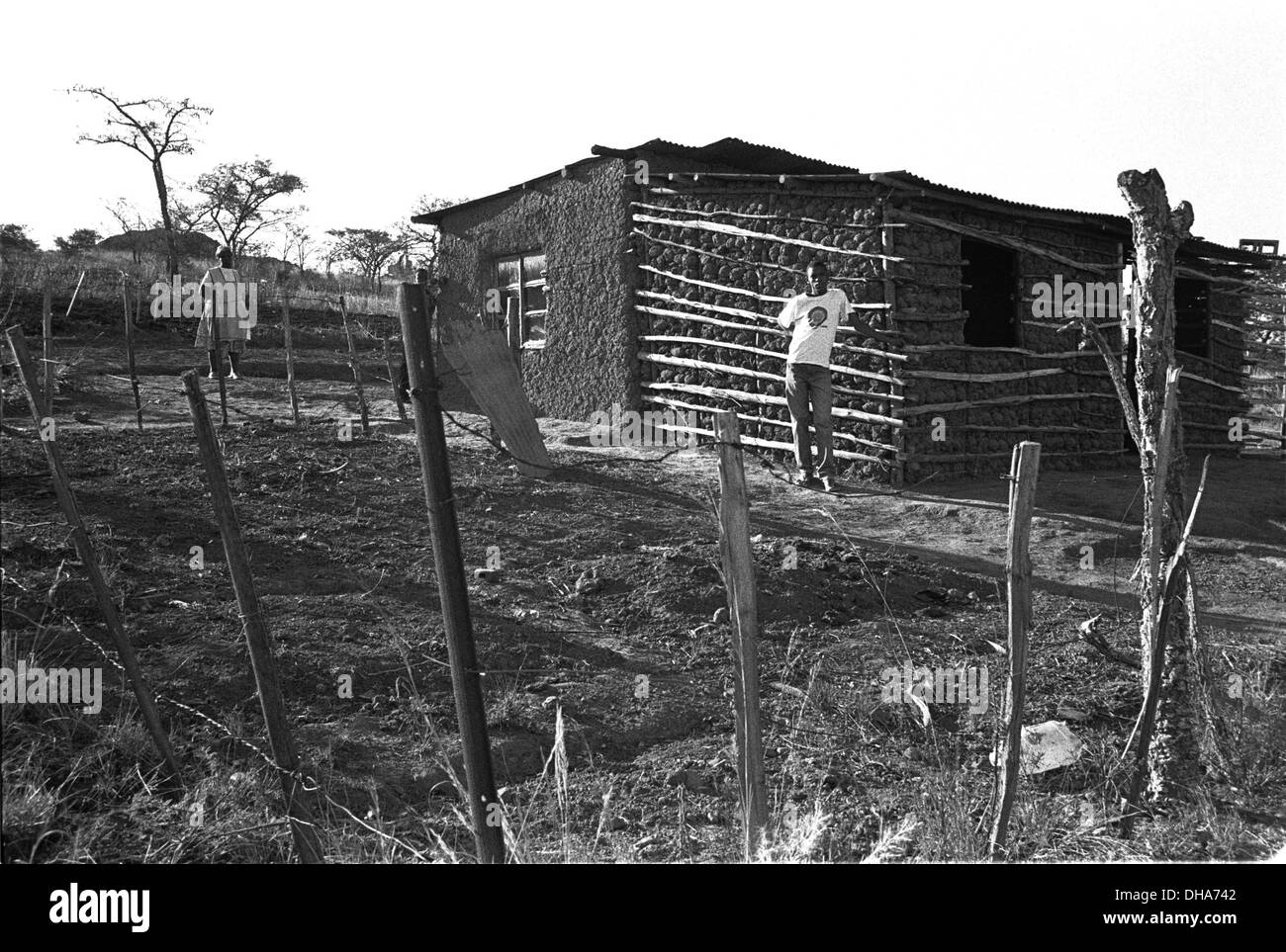 ipjr09090335Poverty and dignity. June 2004. Ms Mzila eldest son outside the extended home.. Ms Mzila, is a single mother Stock Photo