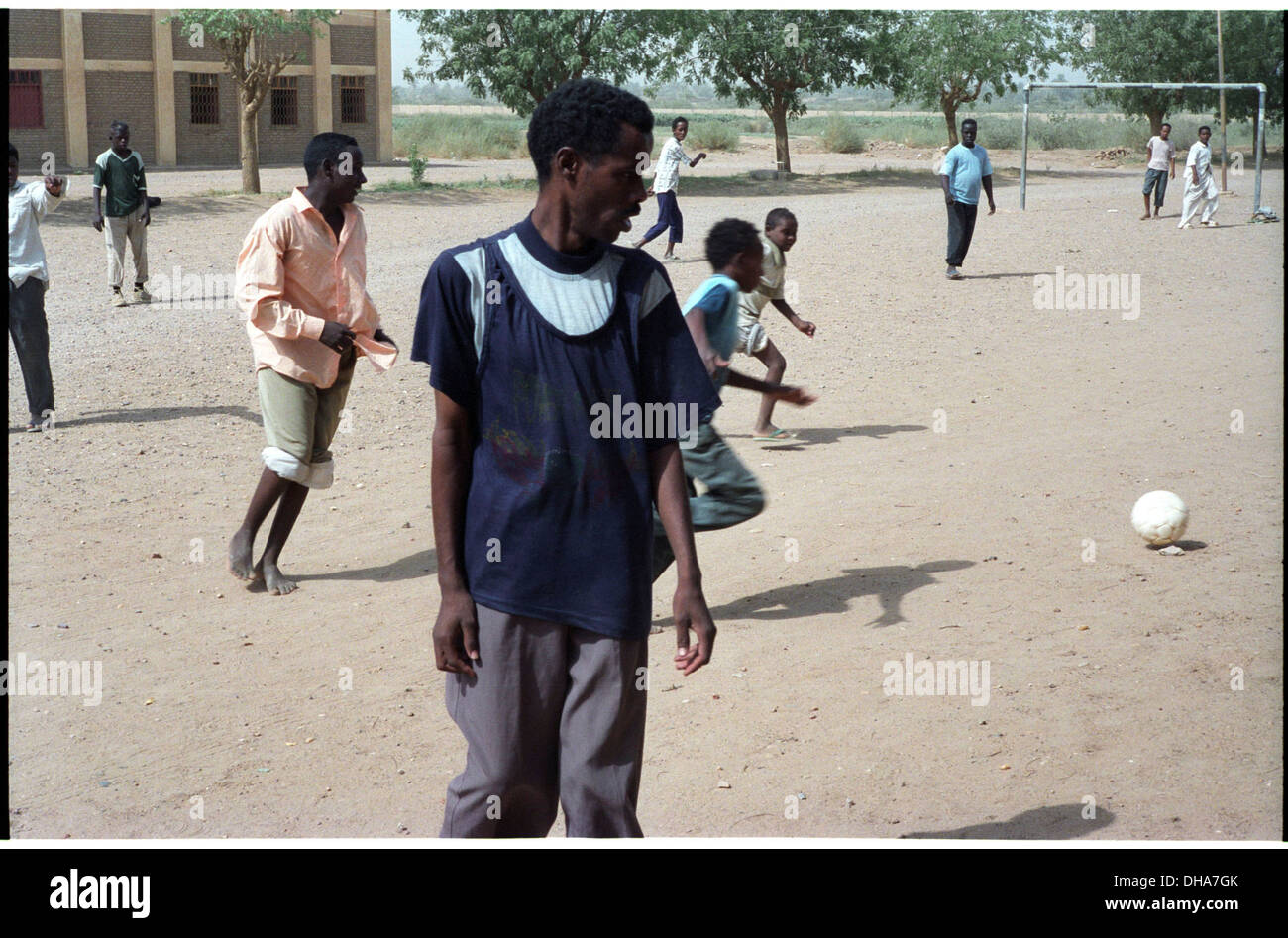 ipjr09441006September 2004 Athbarah Nahr An Nil SudanBoys at the school enjoy a game of football.. Broader Horizons Institute Stock Photo