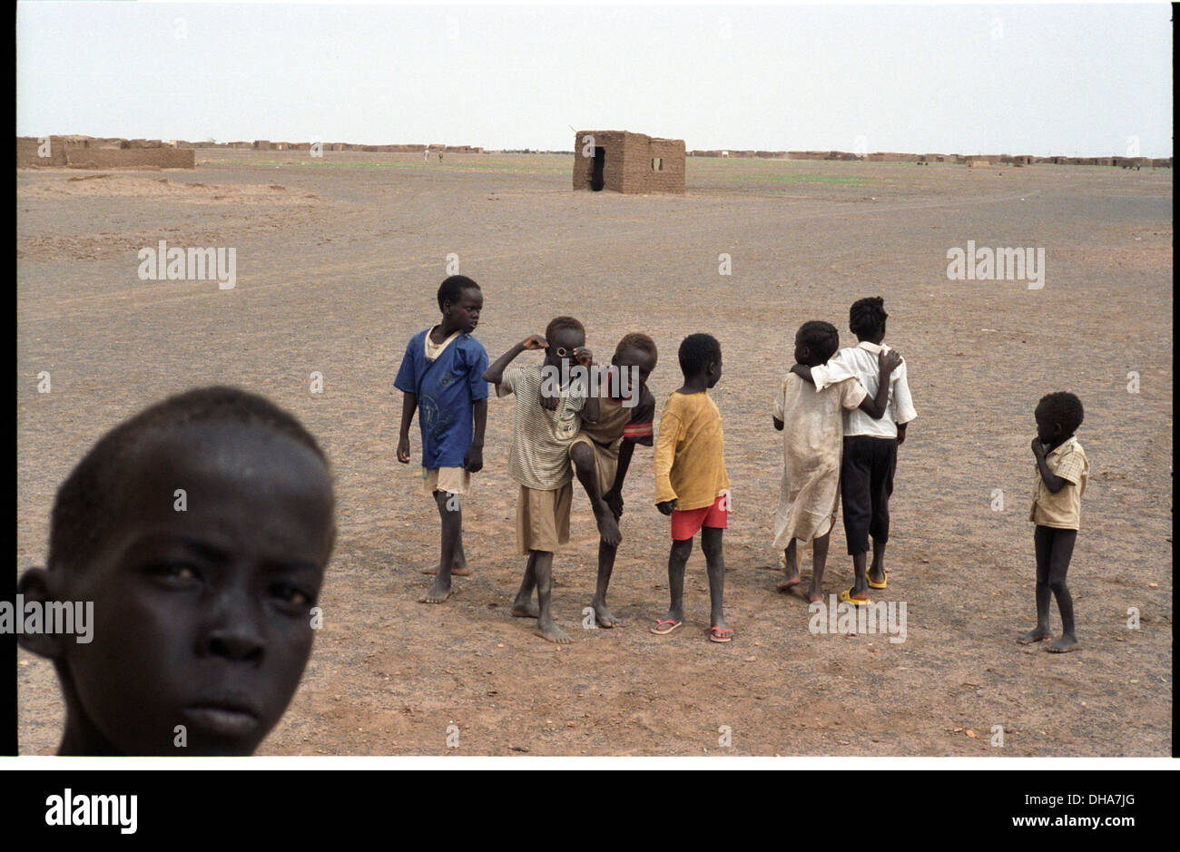 ipjr09440236aSeptember 2004 Gebeiaulia IDP Camp Khartoum Al Khartoum SudanChildren playing in the Gebeialia IDP Camp. Stock Photo