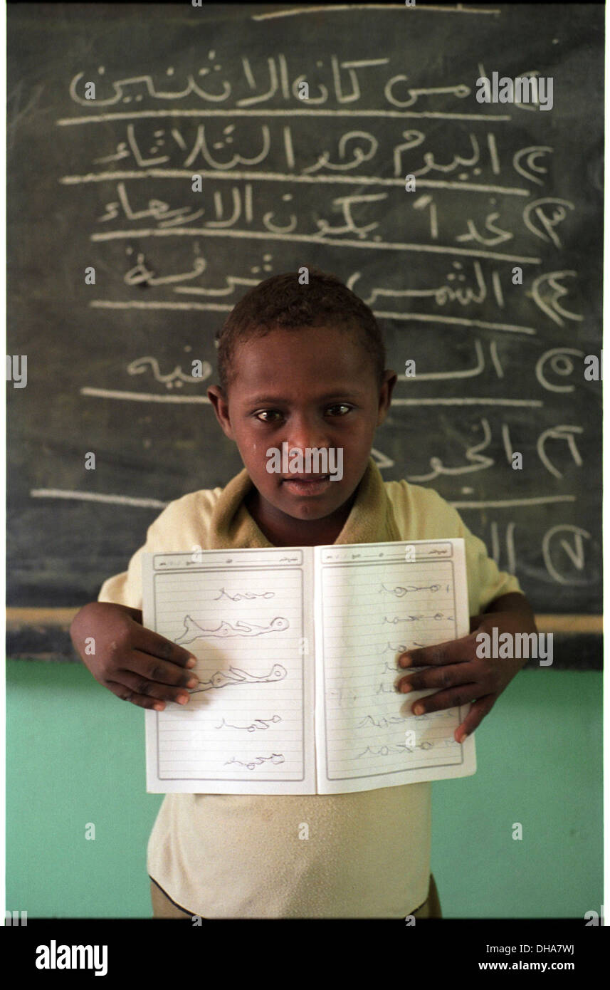 ipjr09441125September 2004 Athbarah Nahr An Nil SudanAhamed can now write his own name in arabic.... Broader Horizons Institute Stock Photo