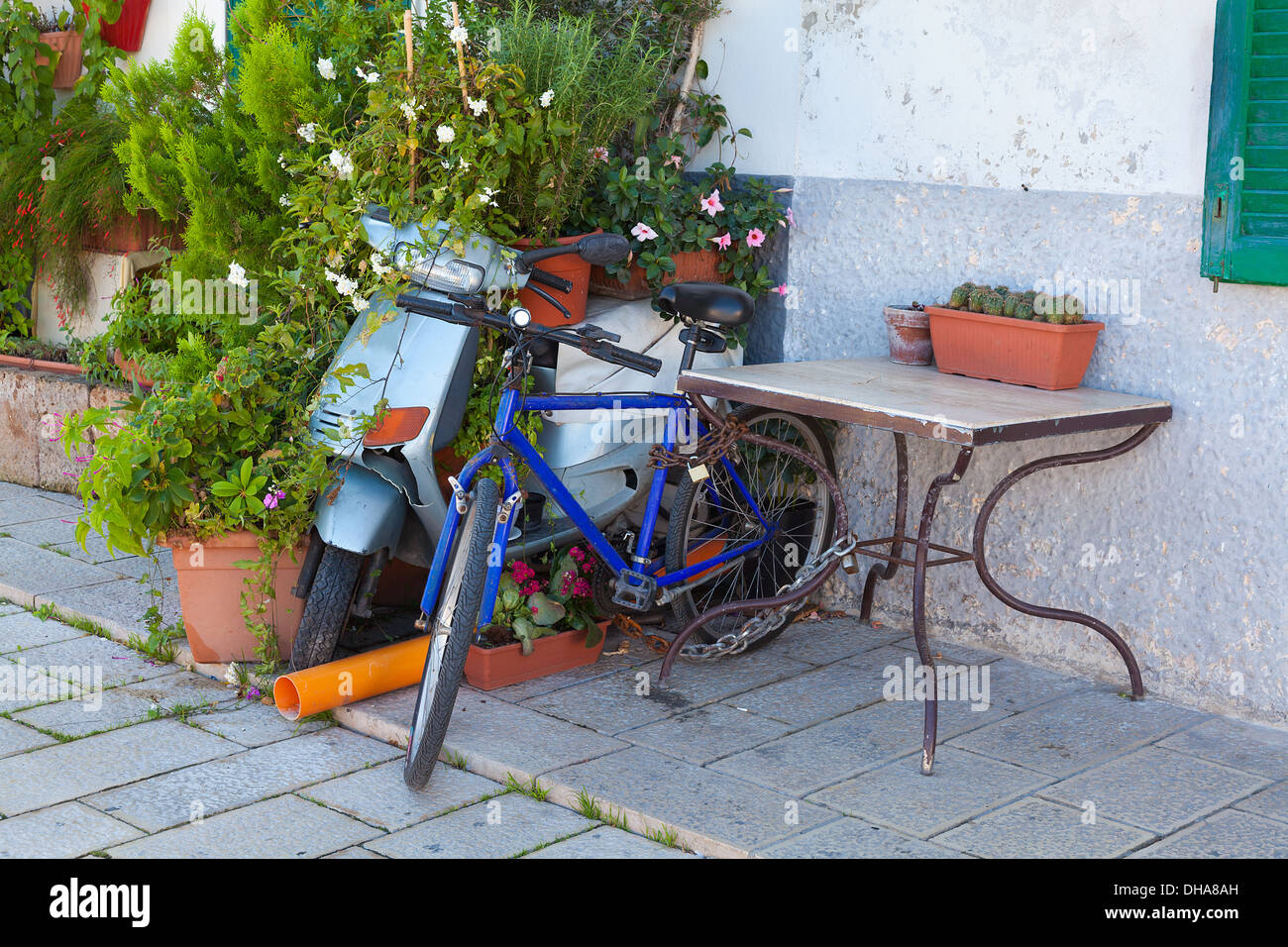Secured motor scooter hires stock photography and images Alamy