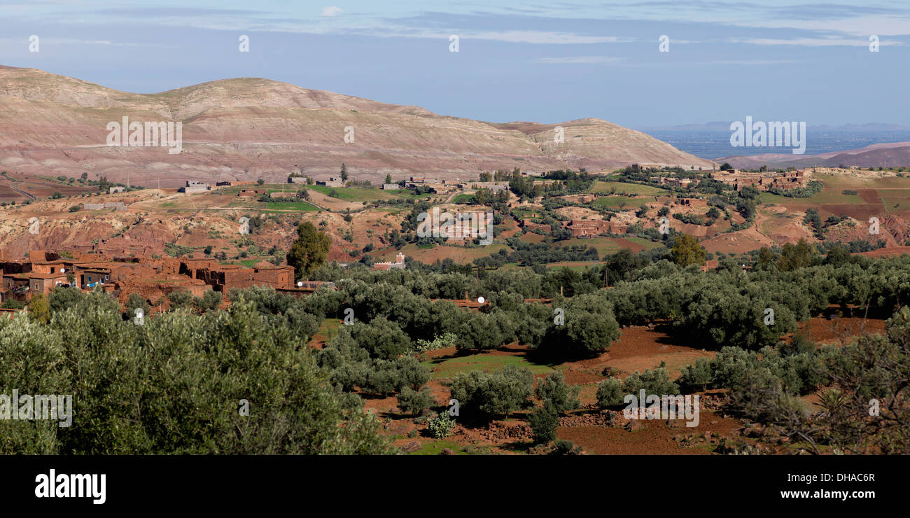 A Town In A Valley With A View Of Mountains In The Distance Stock Photo ...