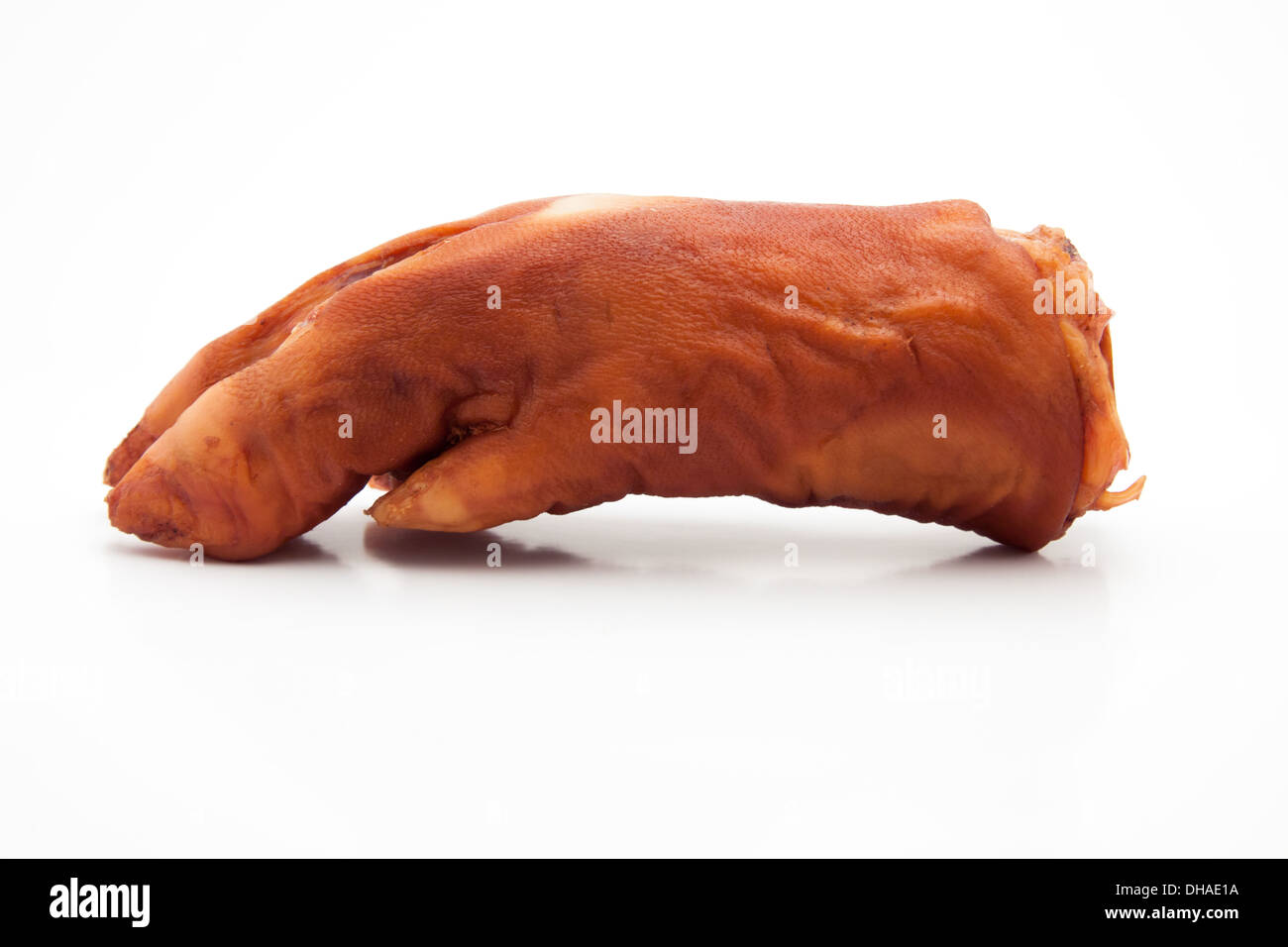 Dry smoked pork  trotters on white background Stock Photo