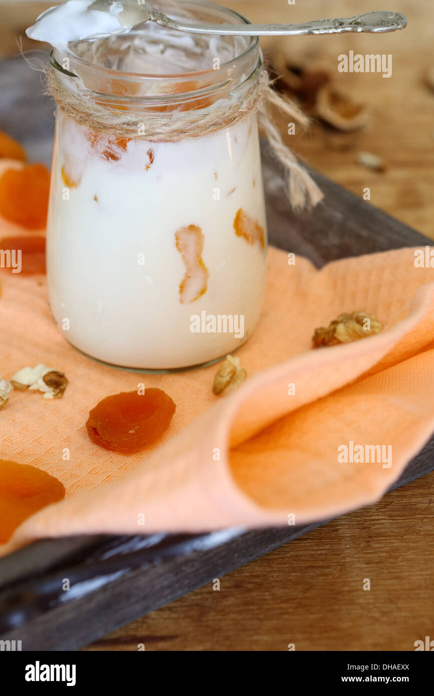fermented milk yogurt in a jar, food close up Stock Photo