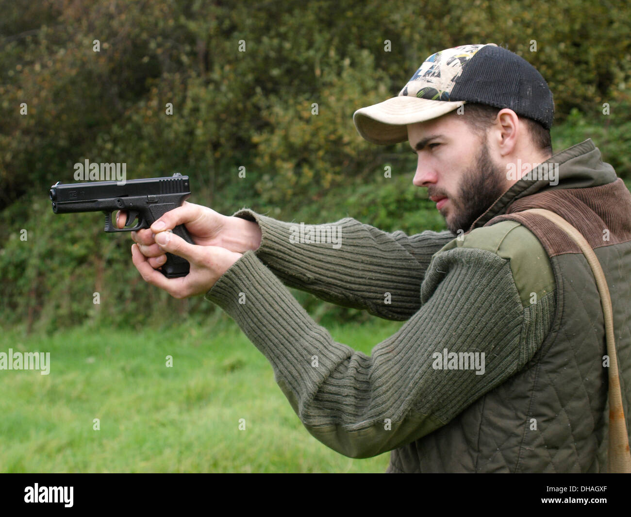 Gun young man uk close up hands hi-res stock photography and images - Alamy