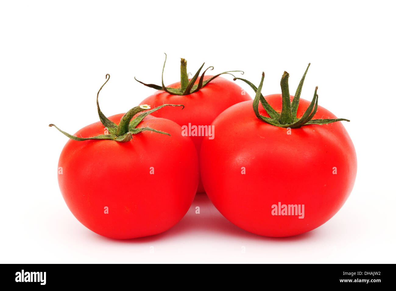 tomato pile isolated on white Stock Photo - Alamy