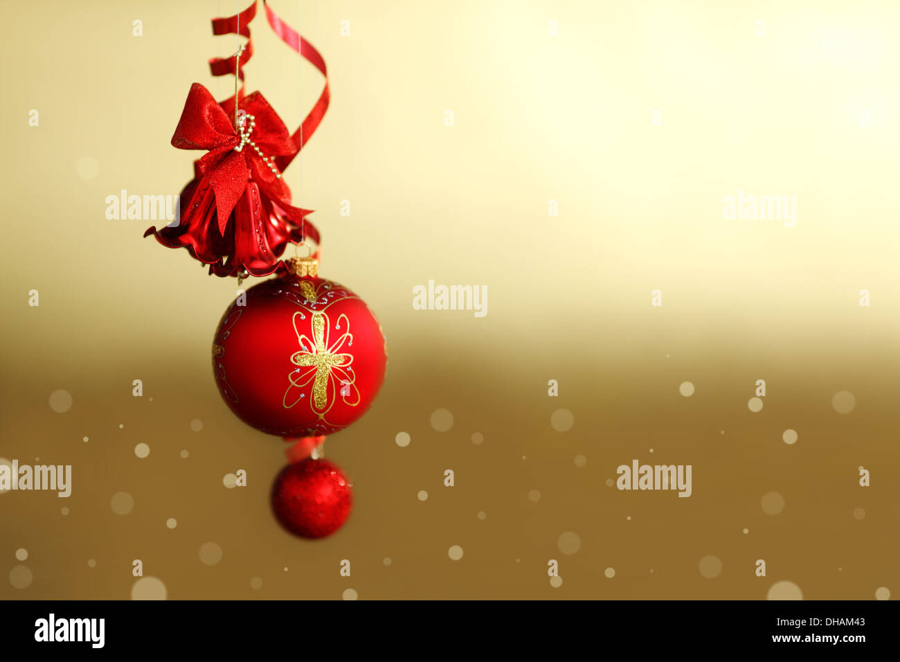 red christmas balls on gold background Stock Photo - Alamy